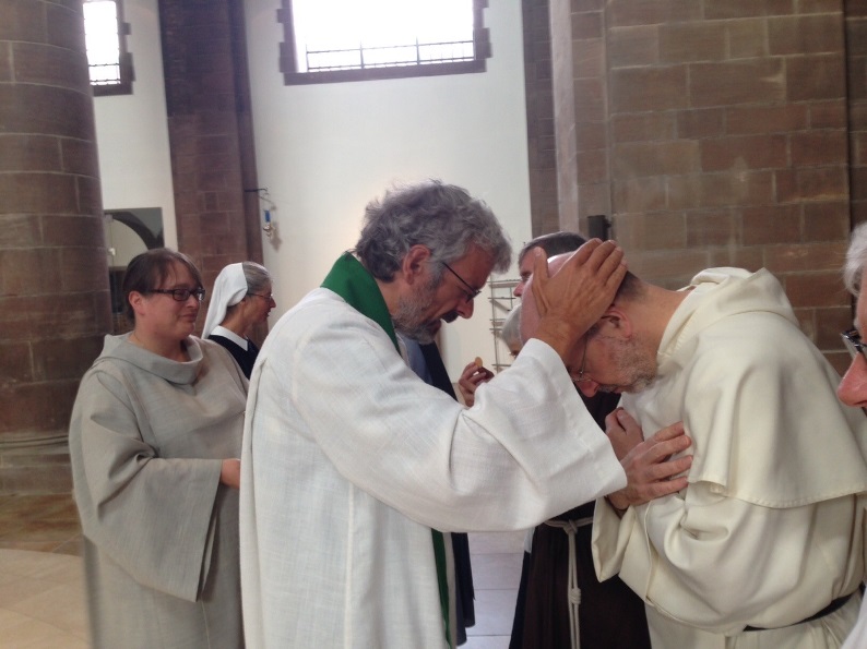 Prot Eucharist Catholic Dominican receiving a blessing smaller